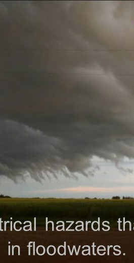 power pole in front of storm clouds