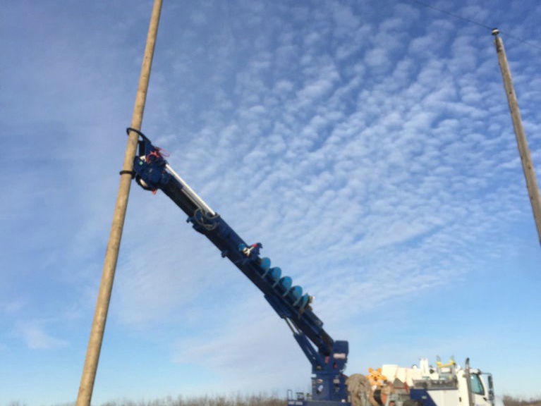 power line technician and lift truck