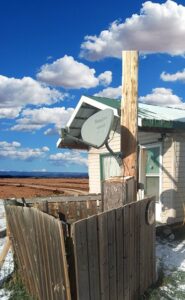 Satellite dishes, fences built too close, and other paraphernalia can prevent poles from being maintained or serviced, especially during a power outage.